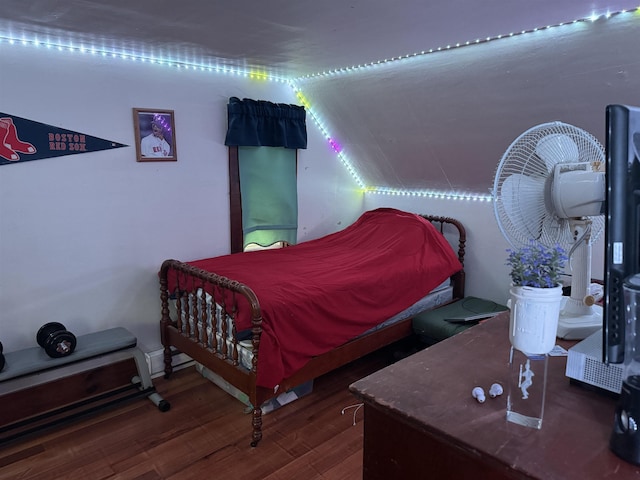 275 Granite Rd, Ossipee, NH 03864 - bedroom with wood finished floors and vaulted ceiling