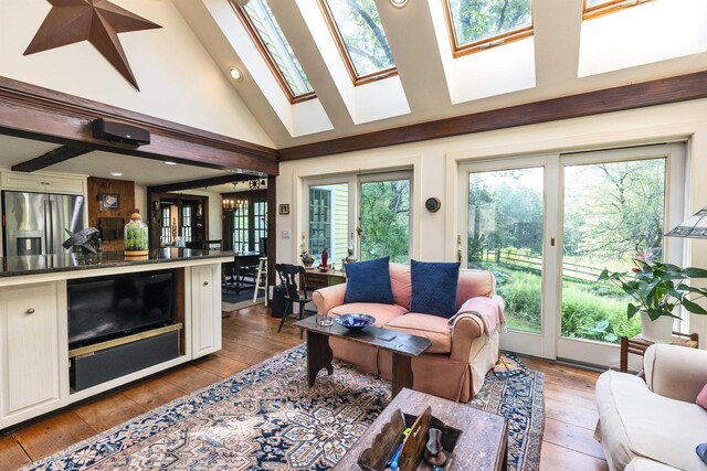 133 Hay Hill Rd, Francestown, NH 03043 - living area featuring healthy amount of natural light, light wood-style flooring, a skylight, high vaulted ceiling, and recessed lighting