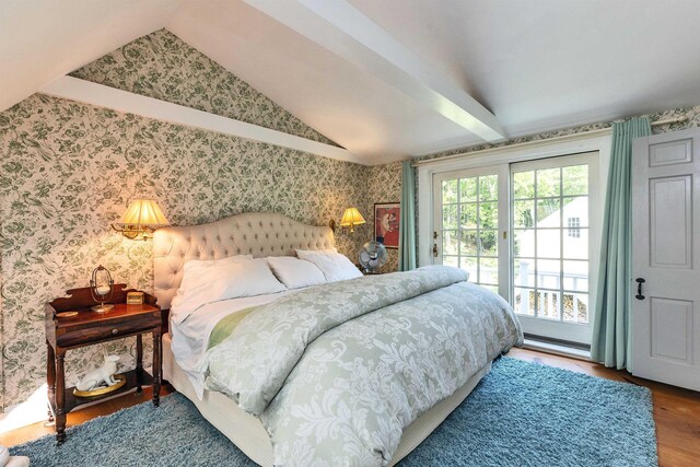 133 Hay Hill Rd, Francestown, NH 03043 - bedroom with access to outside, vaulted ceiling, wallpapered walls, and wood finished floors