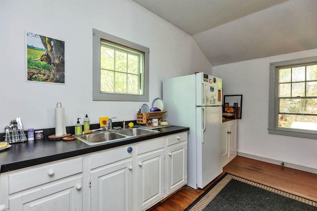 133 Hay Hill Rd, Francestown, NH 03043 - kitchen featuring freestanding refrigerator, dark countertops, dark wood-type flooring, plenty of natural light, and vaulted ceiling
