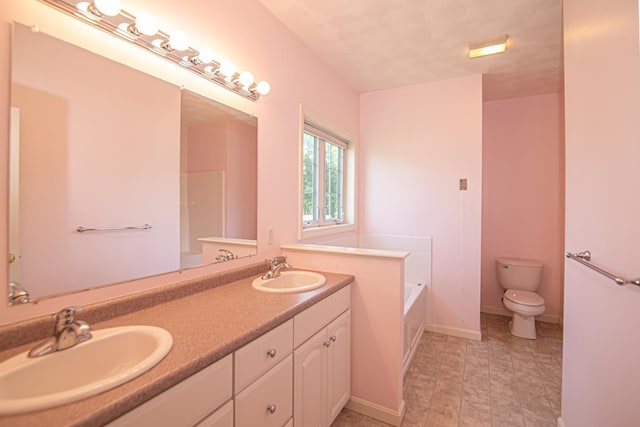 32 Saint Andrews Way, Londonderry, NH 03053 - full bath featuring double vanity and a bath