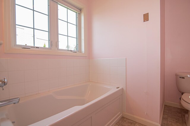32 Saint Andrews Way, Londonderry, NH 03053 - full bathroom with a bath and tile patterned floors