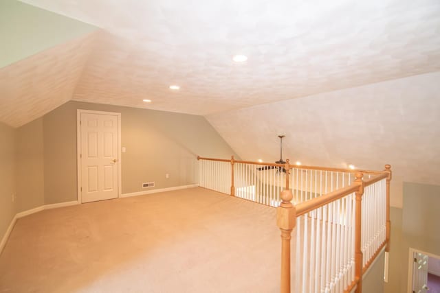 32 Saint Andrews Way, Londonderry, NH 03053 - additional living space with lofted ceiling, carpet flooring, and recessed lighting