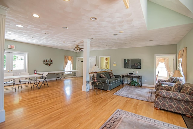 32 Saint Andrews Way, Londonderry, NH 03053 - living room with ornate columns, wood finished floors, recessed lighting, and ceiling fan