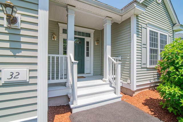 32 Saint Andrews Way, Londonderry, NH 03053 - entrance to property with a porch