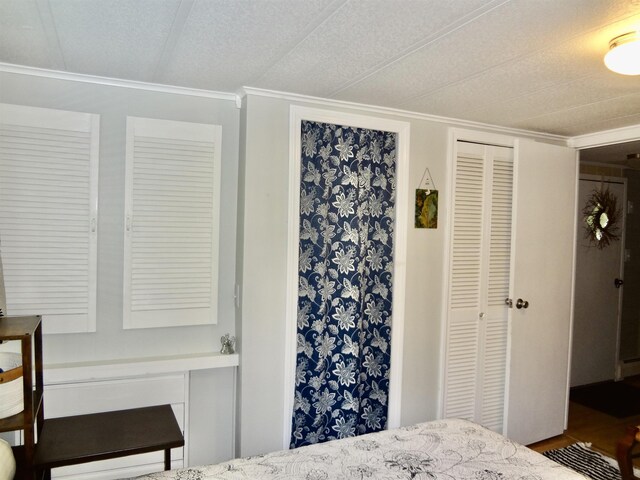 1 Northbrook Rd, Tilton, NH 03276 - bedroom featuring crown molding and wood finished floors