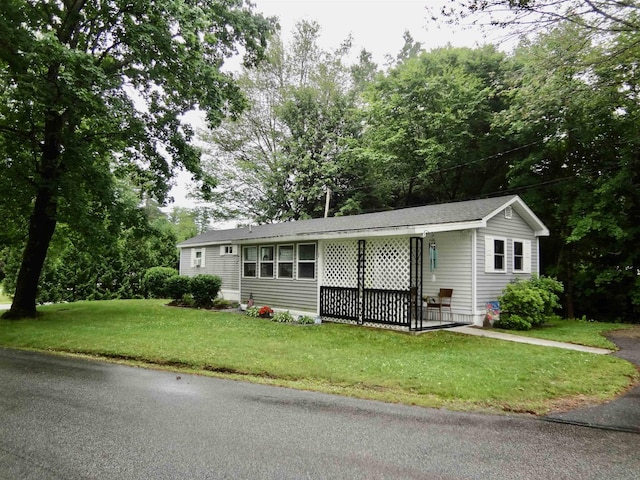 1 Northbrook Rd, Tilton, NH 03276 - single story home featuring a front yard