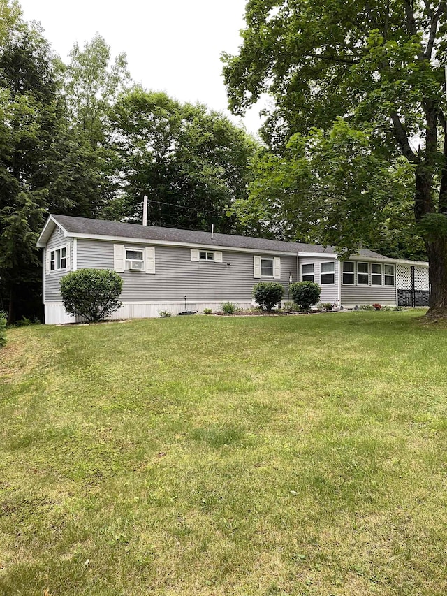 1 Northbrook Rd, Tilton, NH 03276 - view of front of home with a front lawn and view of scattered trees