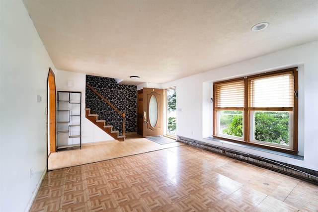 5 Gayle Dr Unit L, Derry, NH 03038 - entrance foyer with stairway, baseboard heating, and parquet flooring