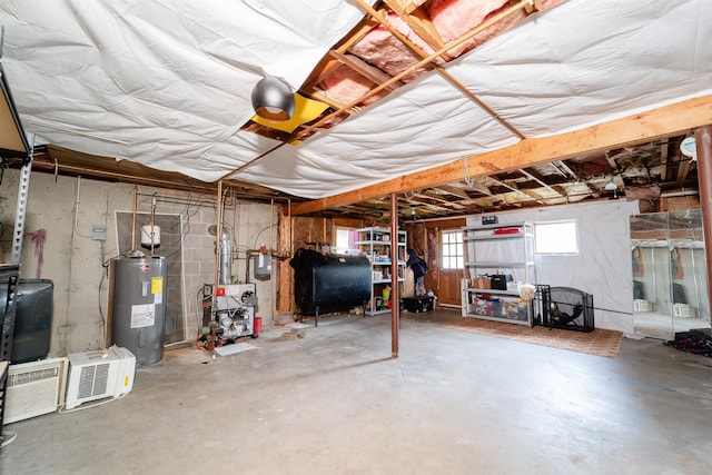 5 Gayle Dr Unit L, Derry, NH 03038 - below grade area with electric water heater, heating fuel, and a heating unit