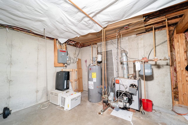 5 Gayle Dr Unit L, Derry, NH 03038 - unfinished below grade area with electric water heater, electric panel, and a heating unit