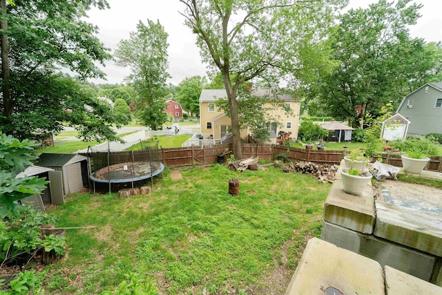 5 Gayle Dr Unit L, Derry, NH 03038 - view of yard featuring a shed, a trampoline, and a residential view