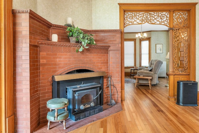 3 Fisher Pl, Claremont, NH 03743 - detailed view of wood finished floors and a chandelier