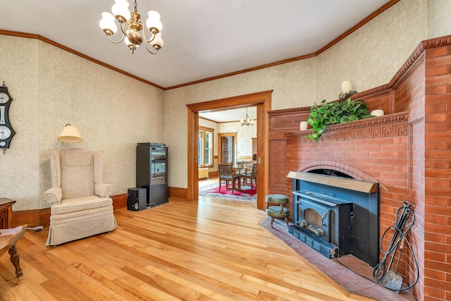 3 Fisher Pl, Claremont, NH 03743 - living area with a chandelier, wood-type flooring, and ornamental molding