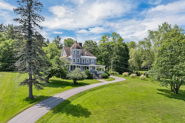 3 Fisher Pl, Claremont, NH 03743 - view of front of property with a front lawn, a chimney, and driveway