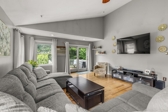 111 Katie Ln, Dover, NH 03820 - living room with vaulted ceiling and wood finished floors