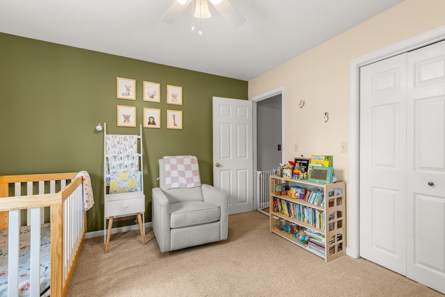 111 Katie Ln, Dover, NH 03820 - bedroom with carpet floors, a closet, ceiling fan, and a nursery area