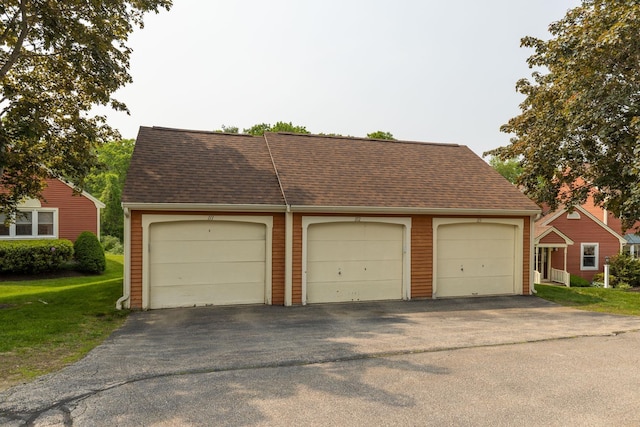 111 Katie Ln, Dover, NH 03820 - view of front facade featuring an outbuilding and a shingled roof