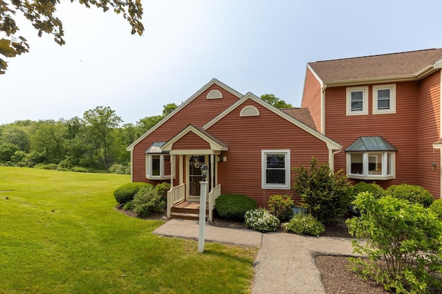 111 Katie Ln, Dover, NH 03820 - view of front facade featuring a front yard