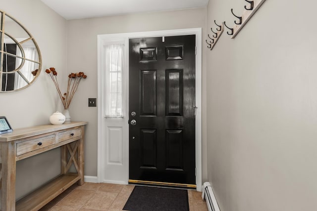 111 Katie Ln, Dover, NH 03820 - foyer entrance featuring light tile patterned floors and a baseboard radiator