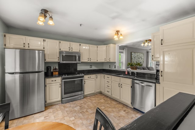 111 Katie Ln, Dover, NH 03820 - kitchen featuring appliances with stainless steel finishes and a sink