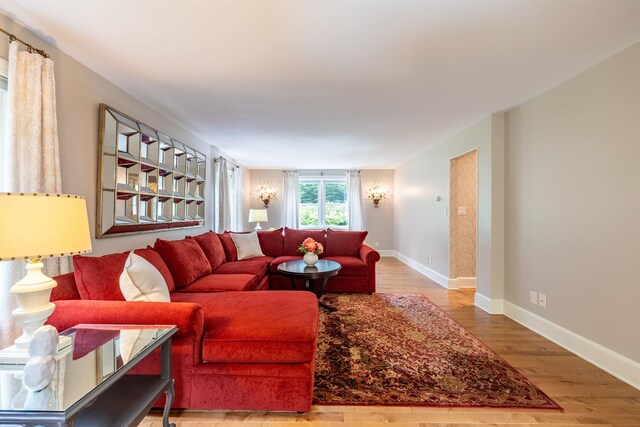 146 Old Sandown Rd, Chester, NH 03036 - living room featuring wood finished floors and baseboards