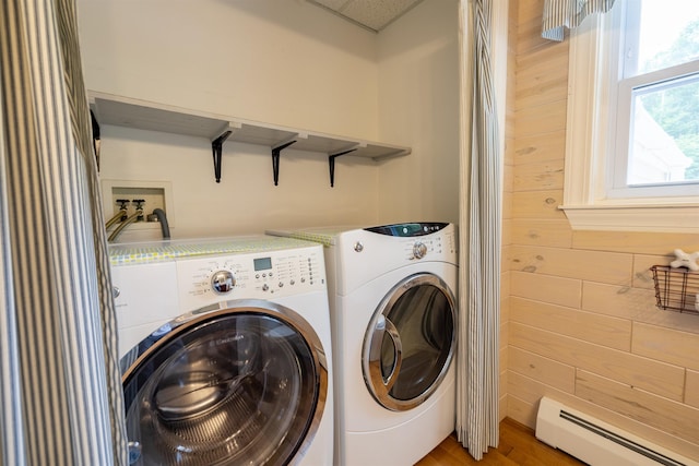 146 Old Sandown Rd, Chester, NH 03036 - laundry room featuring baseboard heating, washing machine and clothes dryer, and light wood-style flooring