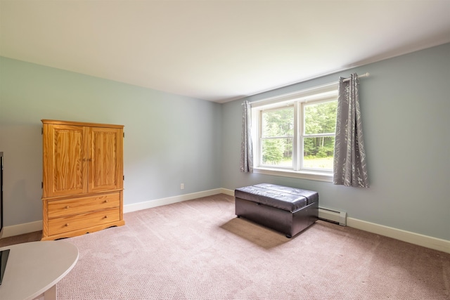 146 Old Sandown Rd, Chester, NH 03036 - spare room with a baseboard heating unit and light carpet