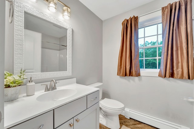 27 Westbrook Dr, New Ipswich, NH 03071 - bathroom featuring a baseboard radiator, vanity, wood finished floors, and a shower