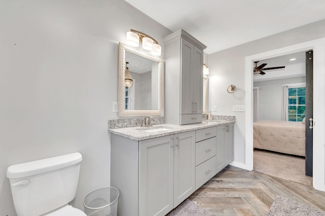 27 Westbrook Dr, New Ipswich, NH 03071 - bathroom with double vanity, connected bathroom, and ceiling fan