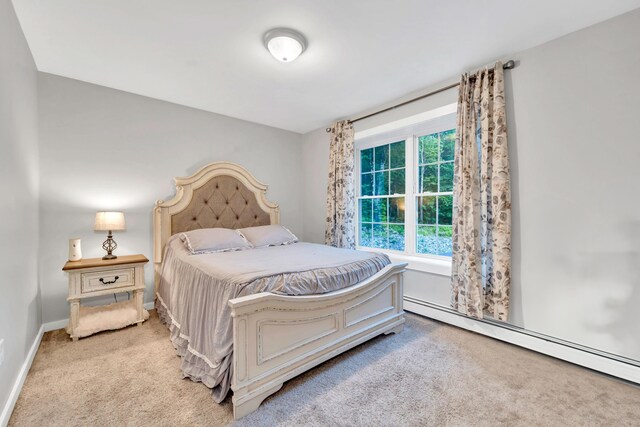 27 Westbrook Dr, New Ipswich, NH 03071 - carpeted bedroom featuring a baseboard heating unit and baseboards