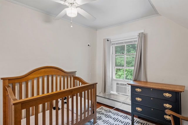 19 Highland St, Concord, NH 03301 - bedroom featuring wood finished floors, ornamental molding, a ceiling fan, and a crib