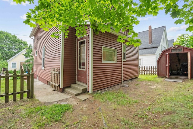 19 Highland St, Concord, NH 03301 - view of property exterior featuring a storage shed and entry steps