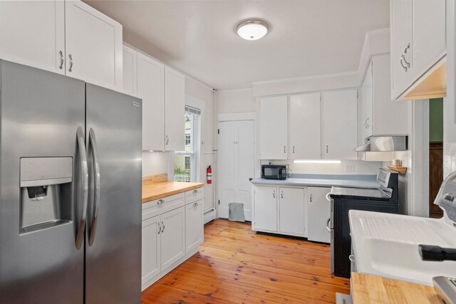 19 Highland St, Concord, NH 03301 - kitchen with stainless steel fridge with ice dispenser, black microwave, electric range, and white cabinetry