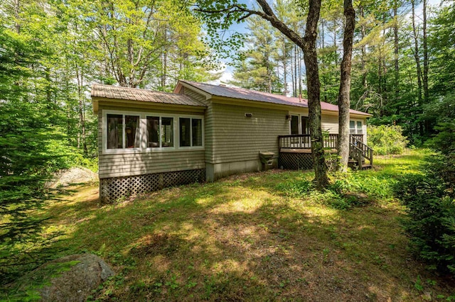 70 Tabor Cir, Albany, NH 03818 - back of house featuring a metal roof and a wooden deck