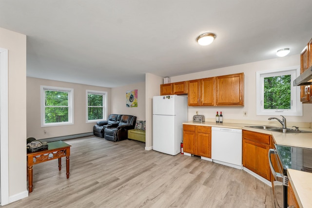 24 Meredith Center Rd, Meredith, NH 03253 - kitchen featuring white appliances, light wood-style flooring, and brown cabinets