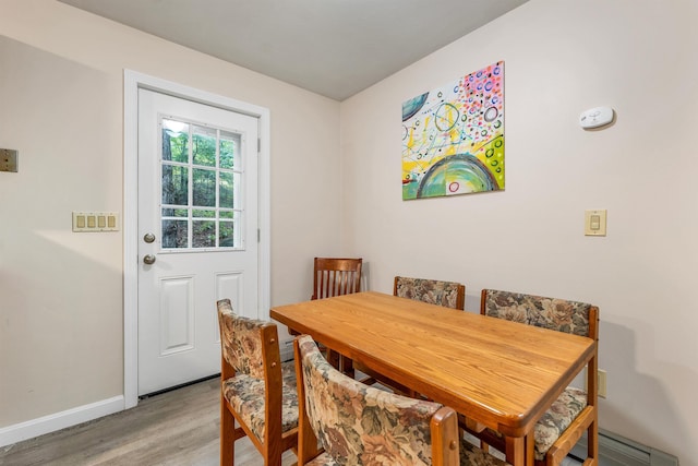 24 Meredith Center Rd, Meredith, NH 03253 - dining space featuring light wood-style floors and baseboards