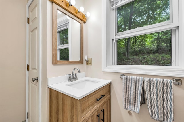 24 Meredith Center Rd, Meredith, NH 03253 - bathroom with vanity and plenty of natural light