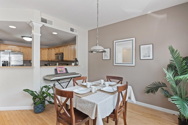 67 Pearl St Unit 8, Essex Junction, VT 05452 - dining area featuring light wood-style flooring, ornate columns, and recessed lighting