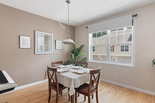 67 Pearl St Unit 8, Essex Junction, VT 05452 - dining area with baseboards and light wood-style floors