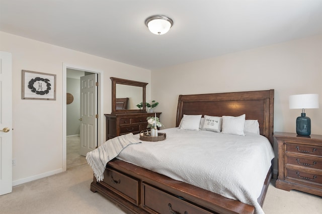 67 Pearl St Unit 8, Essex Junction, VT 05452 - bedroom featuring light colored carpet and baseboards