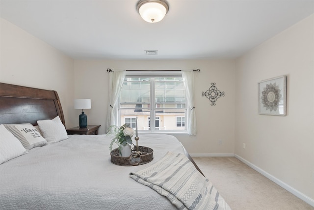 67 Pearl St Unit 8, Essex Junction, VT 05452 - carpeted bedroom featuring baseboards