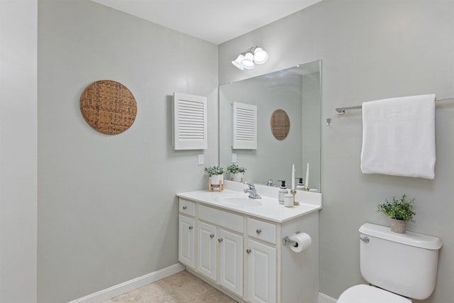 67 Pearl St Unit 8, Essex Junction, VT 05452 - bathroom featuring vanity and baseboards