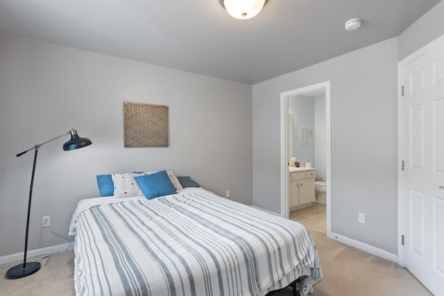 67 Pearl St Unit 8, Essex Junction, VT 05452 - bedroom featuring light colored carpet and ensuite bath