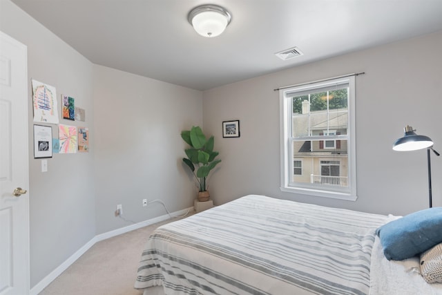67 Pearl St Unit 8, Essex Junction, VT 05452 - bedroom featuring carpet flooring and baseboards