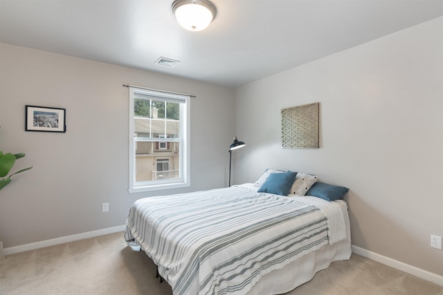 67 Pearl St Unit 8, Essex Junction, VT 05452 - carpeted bedroom with baseboards