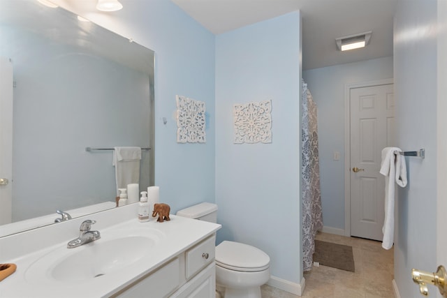 67 Pearl St Unit 8, Essex Junction, VT 05452 - bathroom featuring vanity, a shower with curtain, and tile patterned floors