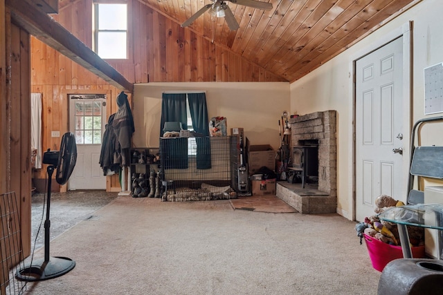 11 Providence Ave, Claremont, NH 03743 - living area with carpet flooring, wood ceiling, a ceiling fan, wooden walls, and high vaulted ceiling