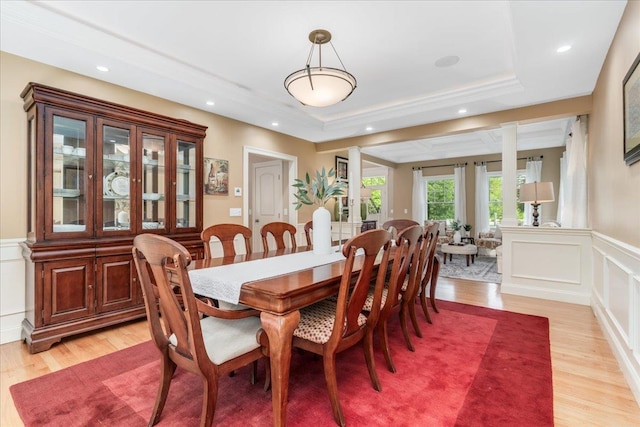 74 Settlers Ct, Bedford, NH 03110 - dining room featuring a decorative wall, light wood-style flooring, wainscoting, a tray ceiling, and recessed lighting