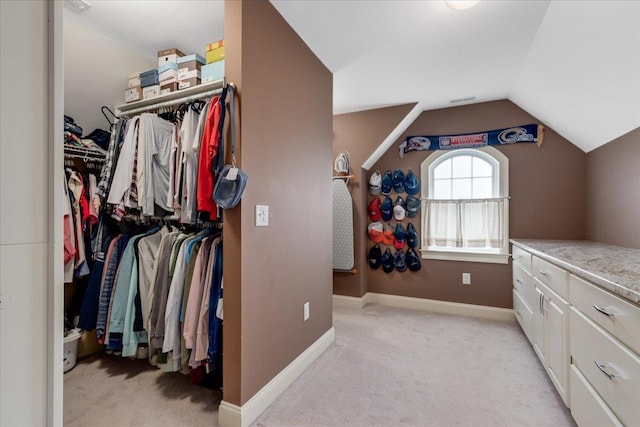 74 Settlers Ct, Bedford, NH 03110 - spacious closet with light colored carpet and vaulted ceiling